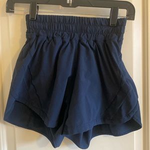 Lululemon shorts. Zipper pocket. Excellent condition. Size 0 black.